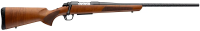 Bolt-action rifle with a polished wooden stock and long black barrel.